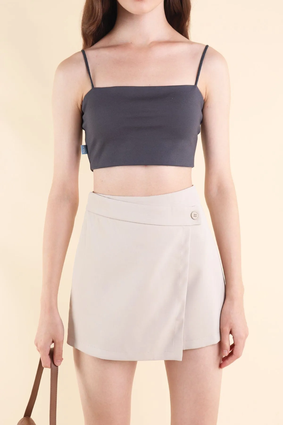 HENLEY ASYMMETRICAL SKORTS IN ECRU