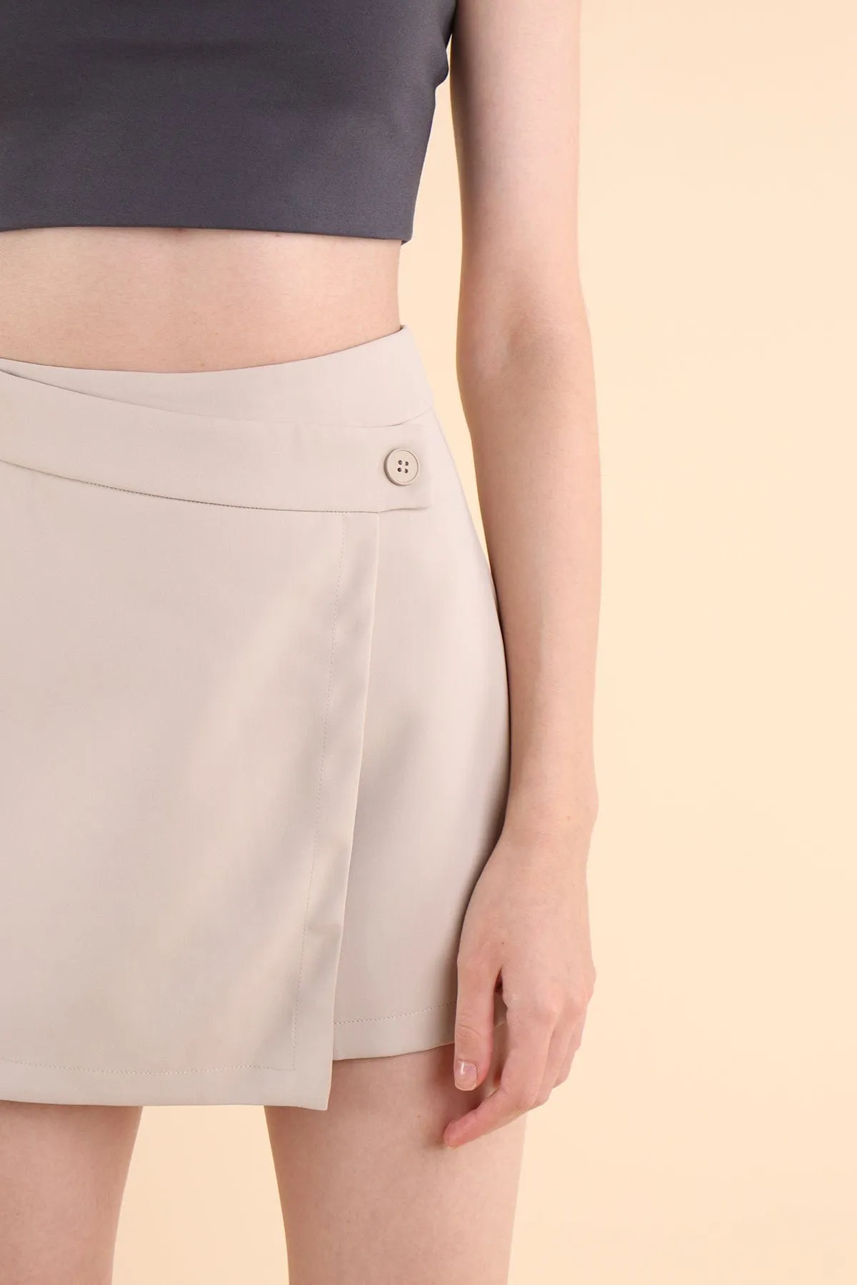 HENLEY ASYMMETRICAL SKORTS IN ECRU